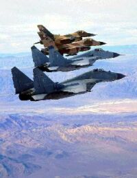 German MiG-29s and American F-16 Falcons over the Nellis Range during a Red Flag exercise (19 KB)